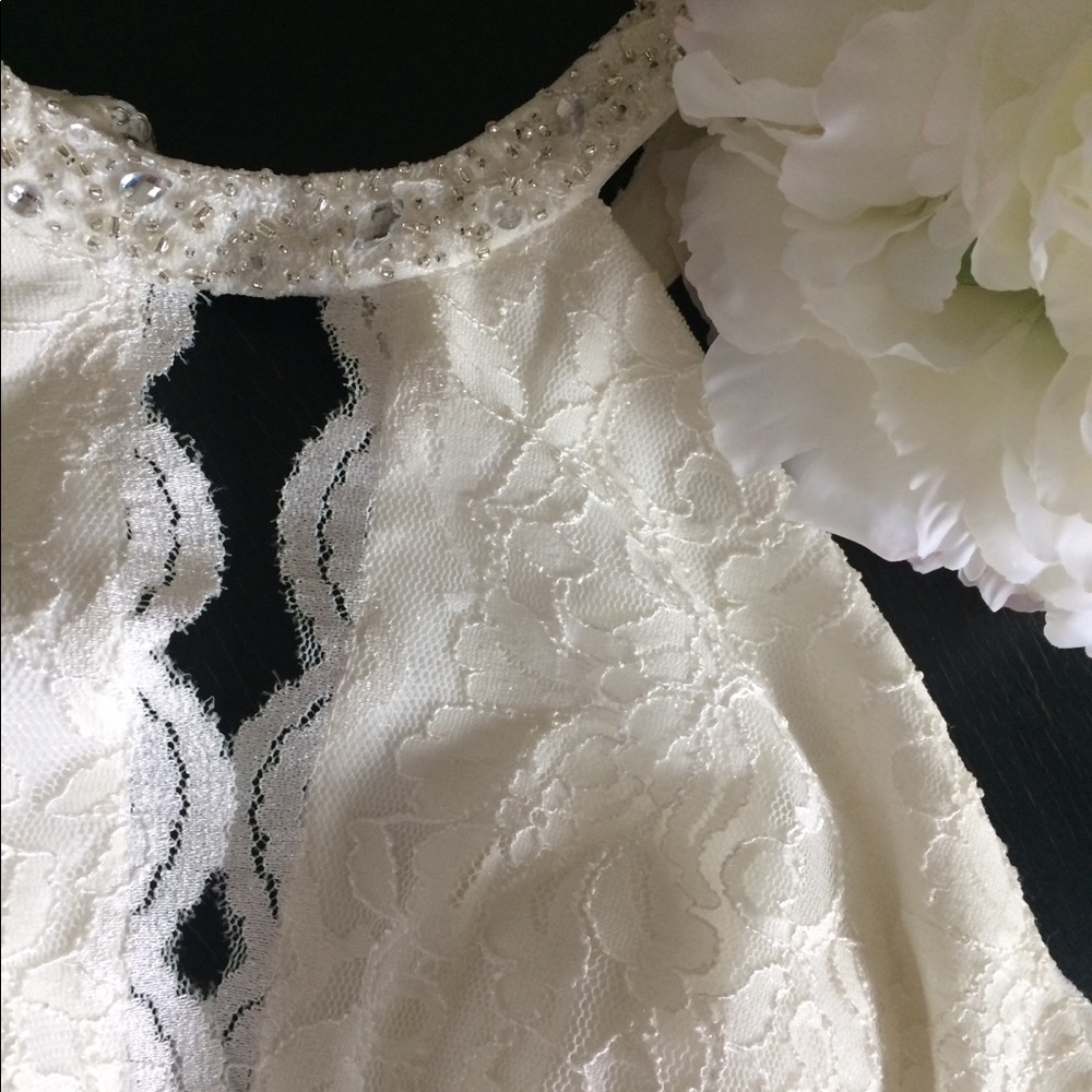White lace David’s bridal rehearsal dress